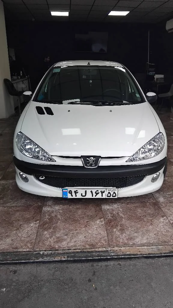 نمای 2 از خرید پژو 206 SD V20 مدل 2009-1388 مدل 2009-1388 رنگ سفید نقدی و اقساطی در خودروشاپ