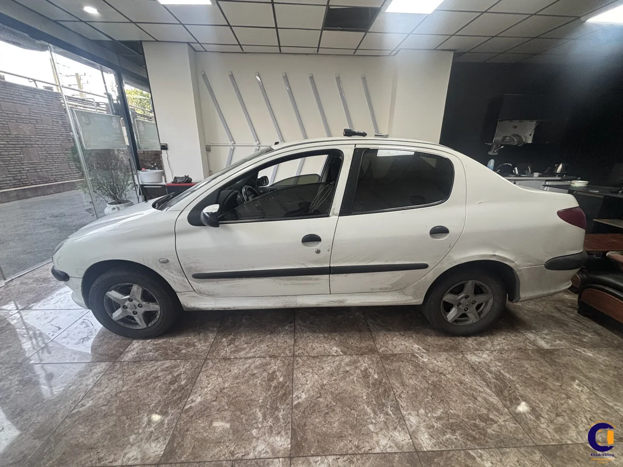 نمای 8 از خرید پژو 206 SD V8 مدل 2009-1388 مدل 2009-1388 رنگ سفید نقدی و اقساطی در خودروشاپ