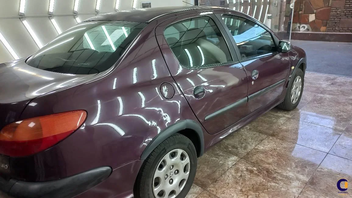 نمای 5 از خرید پژو 206 SD V8 مدل 2010-1389 مدل 2010-1389 رنگ بادمجانی نقدی و اقساطی در خودروشاپ