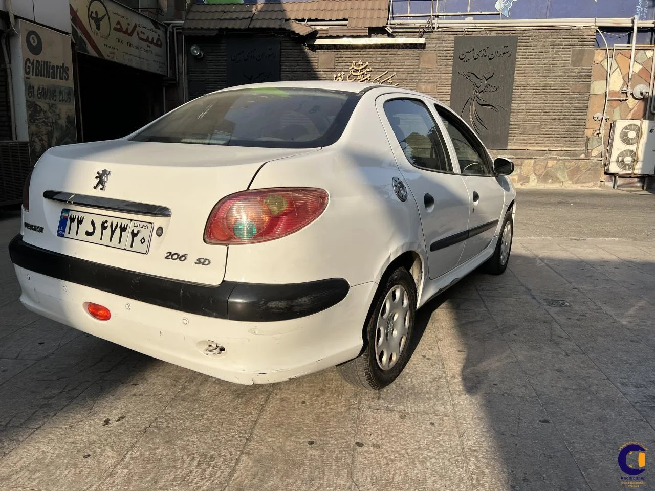 نمای 5 از خرید پژو 206 SD V8 مدل 2012-1391 مدل 2012-1391 رنگ سفید نقدی و اقساطی در خودروشاپ نمای 5 از خرید پژو 206 SD V8 مدل 2012-1391 مدل 2012-1391 رنگ سفید نقدی و اقساطی در خودروشاپ